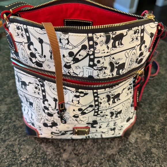 Dooney & Bourne Steamboat Willie Sling Bag - Picture 5 of 7